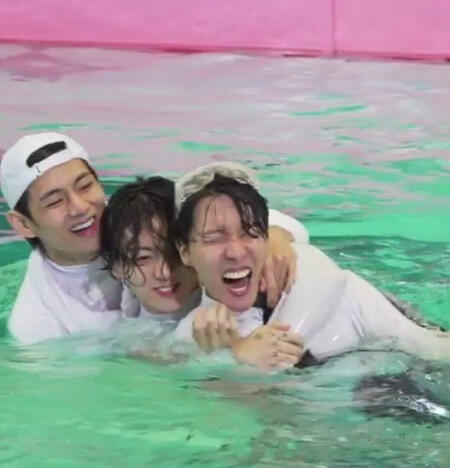 a Moroccan walkway with blooming trees in the afternoon